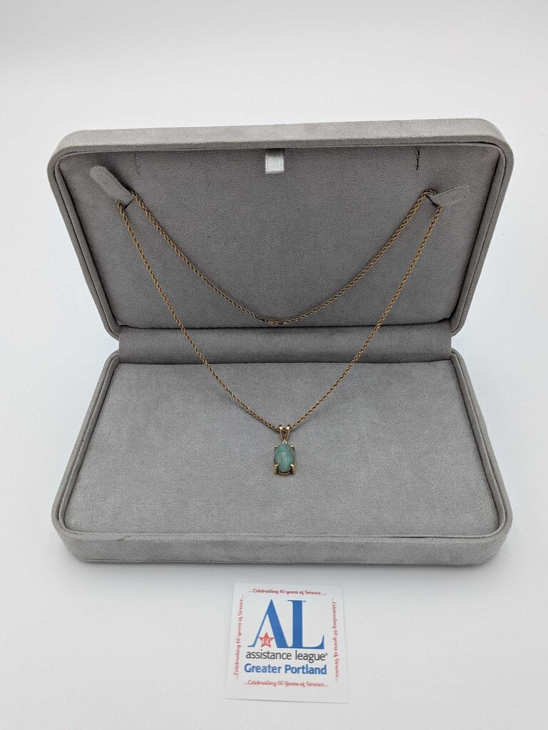 Necklace, Jade cabochon with a single diamond, set in 14K Yellow Gold with 14K Yellow Gold Rope chain.