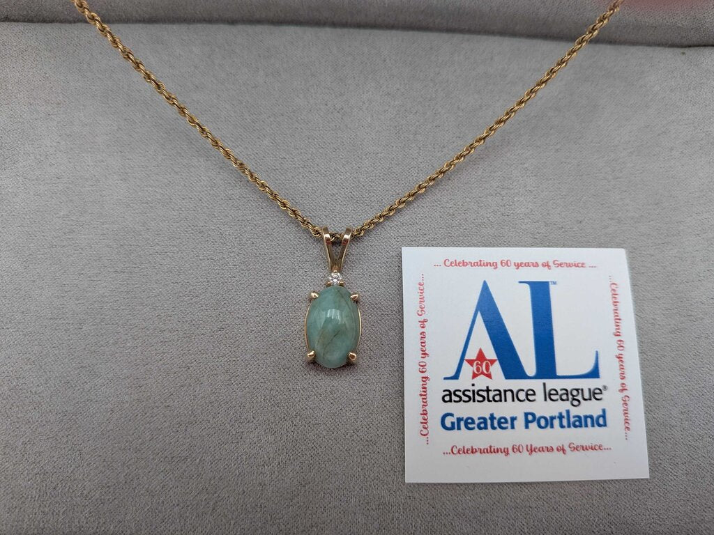 Necklace, Jade cabochon with a single diamond, set in 14K Yellow Gold with 14K Yellow Gold Rope chain.