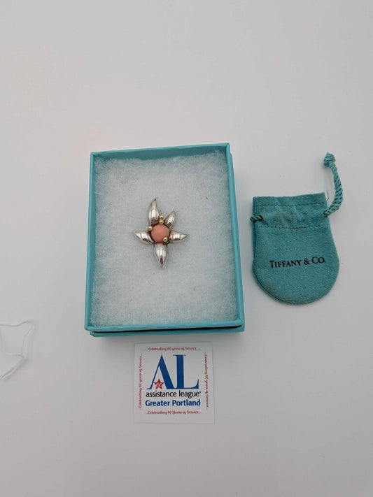 Vintage Pin from Tiffany & Co. 925 Silver and 18K Yellow Gold with an Angel Skin Coral Center. 1.55", Includes original box and bag.
