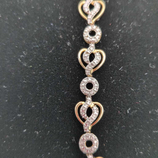7.5" Hearts And Circles bracelet of 925 Silver and Gold Vermeil.